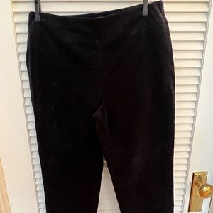 Black velvet side zip pants.